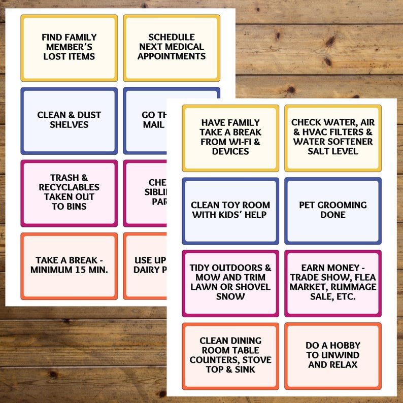 May include: Two sheets of colorful task cards with various household chores and reminders. Each card has a colored border and text such as "Find Family Member's Lost Items" and "Clean Toy Room With Kids' Help."