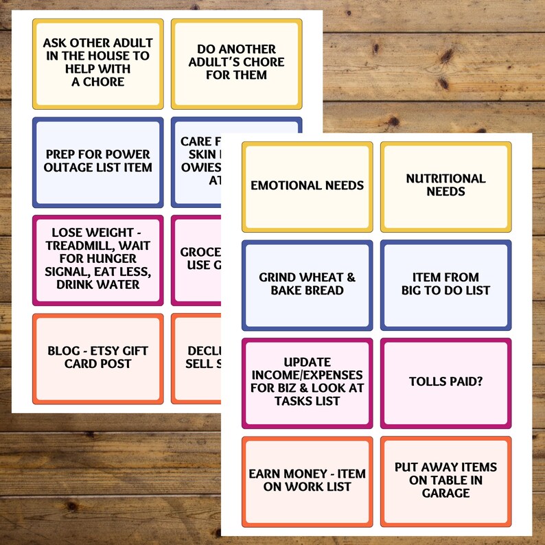 May include: Two sheets of paper with colorful rectangular labels, each containing text. The labels have various colors, including blue, yellow, pink, and orange. The text on the labels includes phrases like "Emotional Needs" and "Grind Wheat & Bake Bread."