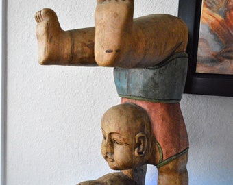 Ornate Petrified Wood Sculpture vintage hand made thai wood sculpture boy side table base nepal indonesia crickett ball asian carving