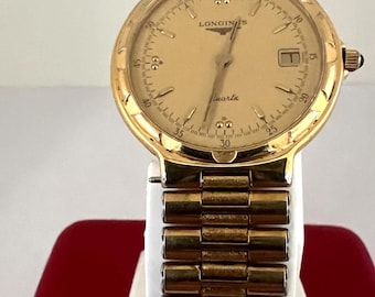 Reloj de cuarzo Longines vintage con esfera dorada Ref: L161.2