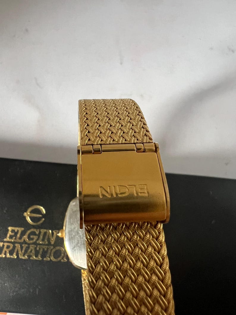 Reloj Elgin para dama con esfera dorada FK266, reloj suizo mtv de cuarzo. imagen 5