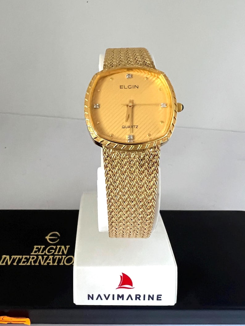 Reloj Elgin para dama con esfera dorada FK266, reloj suizo mtv de cuarzo. imagen 1