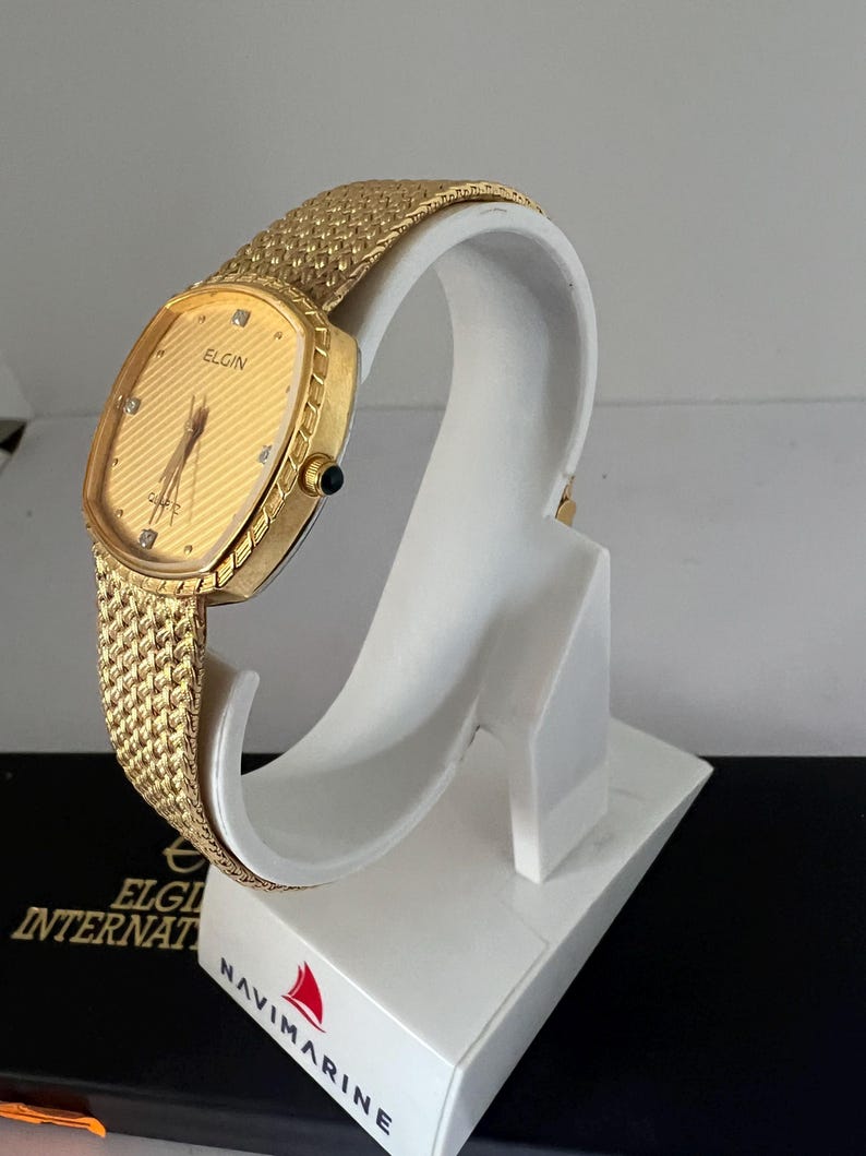 Reloj Elgin para dama con esfera dorada FK266, reloj suizo mtv de cuarzo. imagen 2