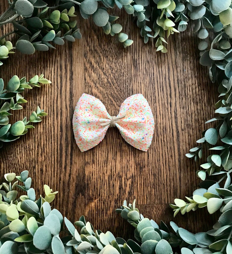 glitter canvas bow finished on a nylon headband or alligator clip Available in 5 beautiful glitters. Large