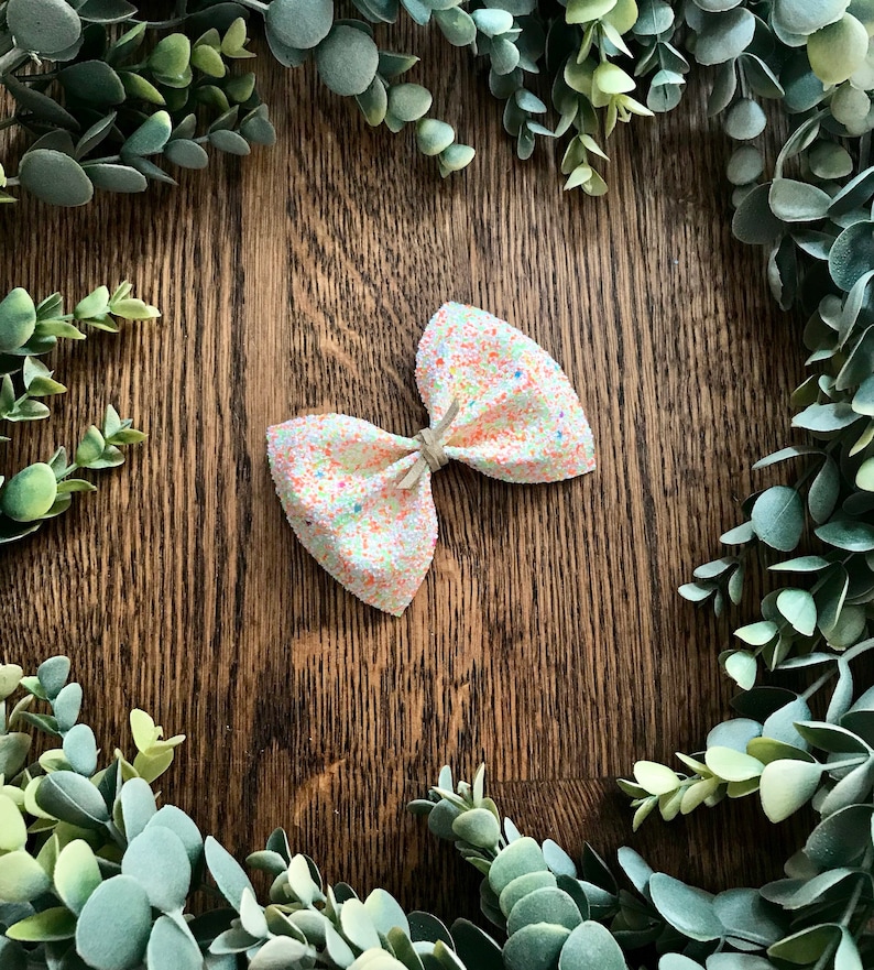 glitter canvas bow finished on a nylon headband or alligator clip Available in 5 beautiful glitters. Large