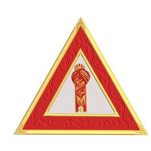 May include: A red and gold triangular frame with a white background and a gold embroidered image of a turbaned figure in the center.