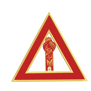 May include: A red triangle with a gold outline, featuring a red and gold turban design in the center.