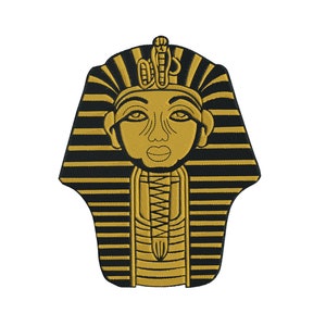 May include: A gold and black embroidered patch depicting the profile of an Egyptian pharaoh wearing a traditional headdress.