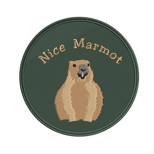 May include: A green circle patch with the text "Nice Marmot" in orange. A brown marmot with a pink nose and tongue is in the center of the patch.