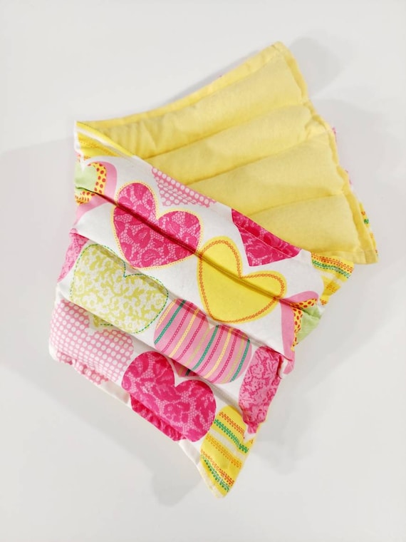 Rice-flax seed therapeutic heating-cooling pad, heat pad, cold pack, rice bag, doula, hearts