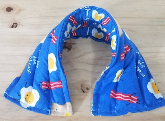 Rice-flax seed therapeutic heating/cooling neck wrap, rice bag, heat pad, cold pack, bacon, eggs, breakfast