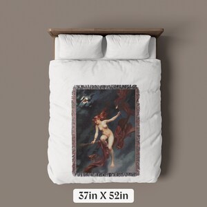 May include: A woven tapestry wall hanging featuring a woman flying on a broomstick with a red cape in a dark sky with a bat flying overhead. The tapestry is 37 inches by 52 inches.