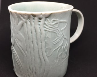 Porcelain cup celadon glaze