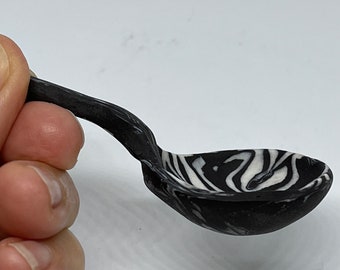 Spoon with swirls