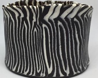 Oval vessel - vase - container, zebra, porcelain and black clay