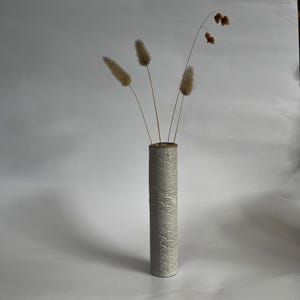 Thin white hanging wall vase