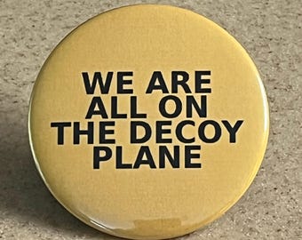 We Are All On The Decoy Plane Pin-Back or Magnet