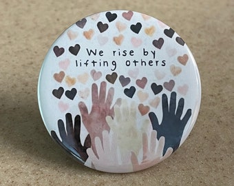 We Rise By Lifting Others Pin-Back Button or Magnet 2 1/4 inch