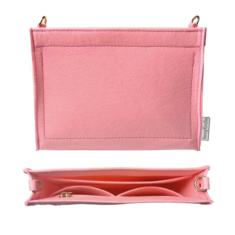 May include: A pink felt handbag organiser with a rectangular main compartment and multiple interior pockets. The organiser has a zipped section and metal ring attachments for a shoulder strap. The brand name "JennyKrafts" is visible on a small tag.