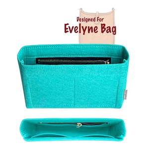 May include: A turquoise felt bag organizer with a black zipper closure and multiple compartments. The text "Designed For Evelyne Bag" is displayed above the organizer. The organizer is designed to fit inside a handbag.