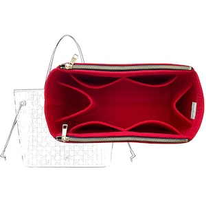 May include: A bright red felt handbag organiser insert featuring multiple interior compartments and two gold-toned metal zips along the top edges. A white fabric tag is attached to the side. A faint white line drawing of a tote bag is visible.