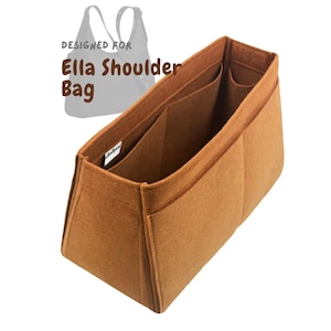 Könnte beinhalten: Ein brauner Filz-Taschenorganizer mit mehreren Fächern, entworfen für die Ella Schultertasche. Der Organizer hat eine rechteckige Form mit mehreren Taschen und einem Etikett mit der Aufschrift "Designed For Ella Shoulder Bag".