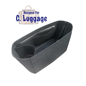 May include: A black felt bag organizer with multiple compartments and a zippered pocket. The organizer is designed for C. Luggage.