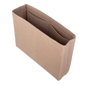 Op de afbeelding: Beige feltaschenorganizer met meerdere vakken en zakken.