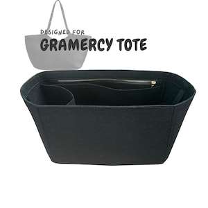 May include: Black felt bag organizer with multiple pockets and a zippered top. The organizer is designed for the Gramercy Tote.