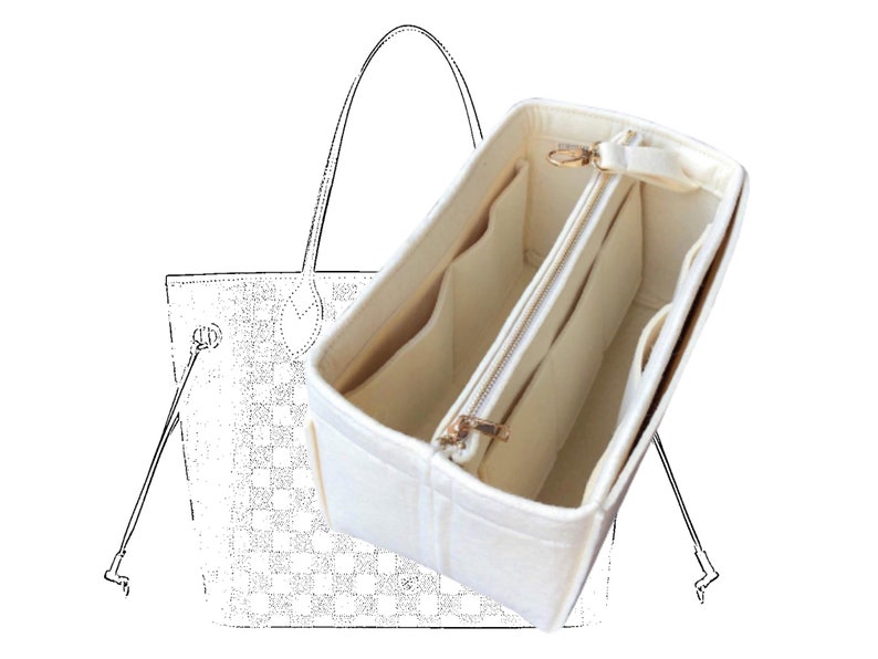 Pode incluir: Um organizador de bolsa de feltro branco com v&aacute;rios compartimentos e fecho de correr. O organizador &eacute; projetado para caber dentro de uma bolsa tote maior.