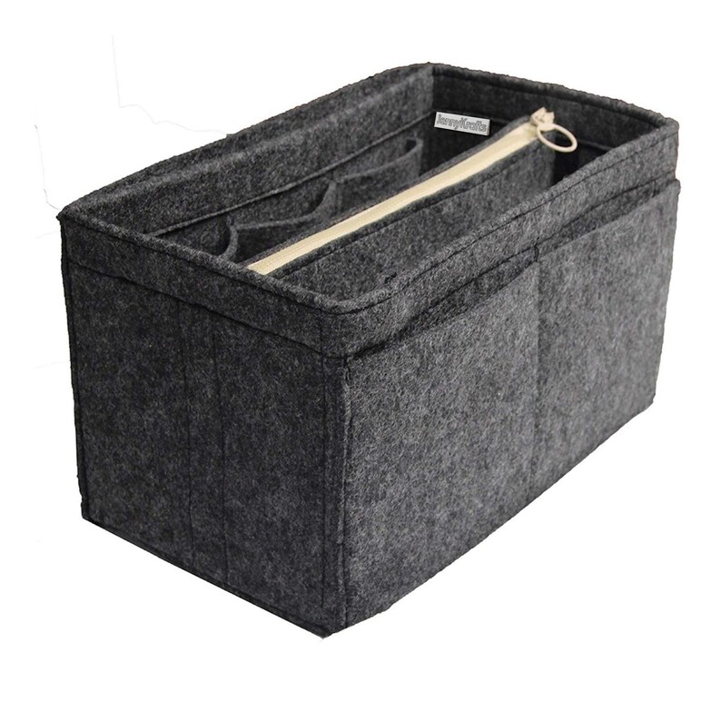 May include: A dark gray felt handbag organizer insert featuring multiple interior compartments, a central zippered pocket with a beige zipper, and a small white rectangular label with the text "JennyKraft" sewn into the inner side wall.