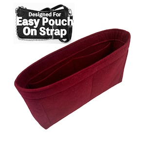 May include: Burgundy felt bag organizer with multiple compartments and pockets. Designed for Easy Pouch On Strap.