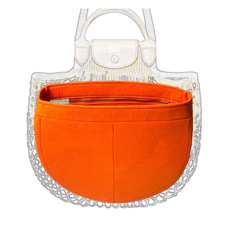 May include: Bright orange felt handbag organizer with a zippered top and multiple pockets. The organizer is designed to fit inside a tote bag, providing structure and organization. The interior is a contrasting orange color.
