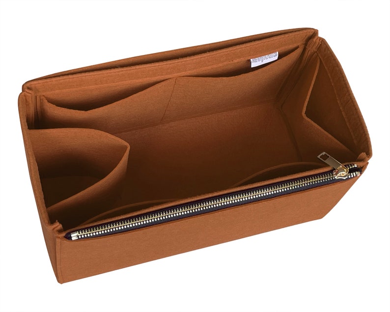 May include: A brown felt bag organiser with multiple compartments and a zipped closure. The organiser has a small label that says "Re-organise".
