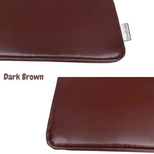 May include: Close-up of a dark brown leather product. The product has a smooth surface and a stitched edge. The text "Dark Brown" is visible in the image. A small tag with the text "lennykrafts" is also visible.
