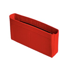 May include: Red felt bag organizer with a zippered top and multiple compartments.