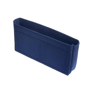 May include: A dark blue felt bag organizer with multiple compartments and a zipper closure.