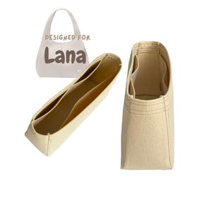 Può includere: Organizzatore per borsa in feltro beige con più scomparti. L'organizzatore è progettato per una borsa con il nome "Lana" stampato su di essa.