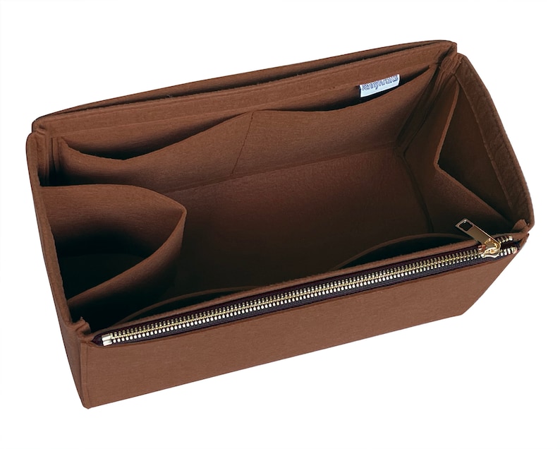 May include: Brown felt bag organiser with multiple compartments and a zipper closure. The organiser has a label that reads "Handy Helpers".