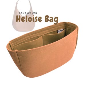 May include: A peach-coloured felt bag organiser with multiple pockets, designed for a Heloise Bag. The organiser is rectangular with a curved top and is designed to fit inside a handbag. The text "DESIGNED FOR Heloise Bag" is visible.