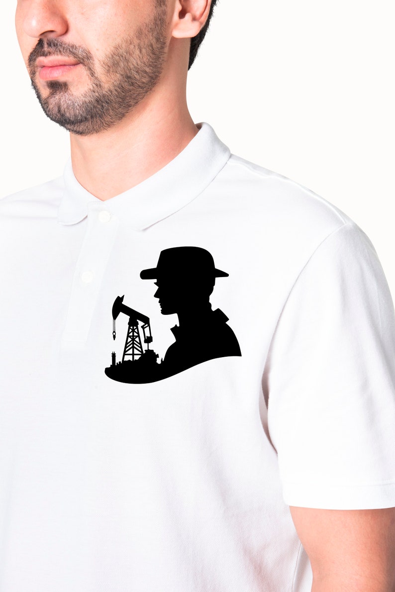 May include: A white polo shirt with a black silhouette of a person wearing a hat and standing next to an oil derrick.