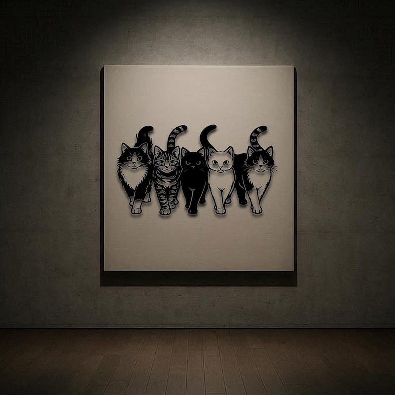 May include: A framed artwork featuring five stylized black and white cat illustrations. The cats are depicted in various poses, with different markings and patterns. The artwork is displayed on a neutral-colored wall.