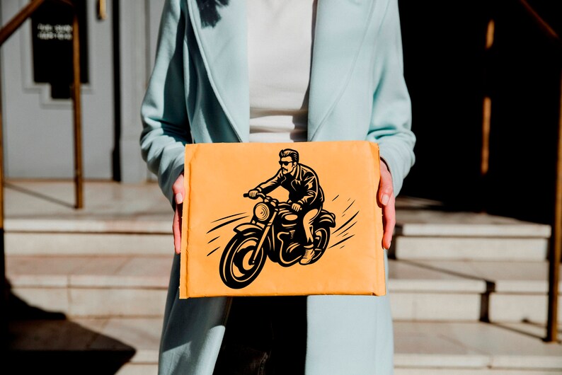 May include: An orange package featuring a black and white illustration of a person riding a motorcycle. The package is held by a person wearing a light blue coat.