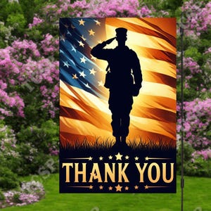 May include: A garden flag featuring a silhouette of a saluting soldier in front of an American flag. The flag has a blue field with white stars and red and white stripes. The words "THANK YOU" are displayed in gold lettering.