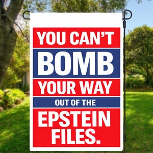 May include: A rectangular garden flag featuring a red, white, and blue color scheme with the text "YOU CAN'T BOMB YOUR WAY OUT OF THE EPSTEIN FILES." The text is displayed in bold, white, capital letters against alternating red and blue horizontal bars.