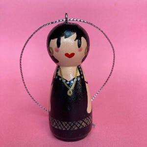 Nessa Gavin and Stacey handpainted Christmas bauble oh what’s occurring