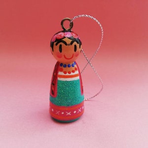Pallina di Natale dipinta a mano da Frida Khalo, artista, icona femminista