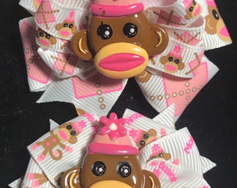 Pink sock monkey bow