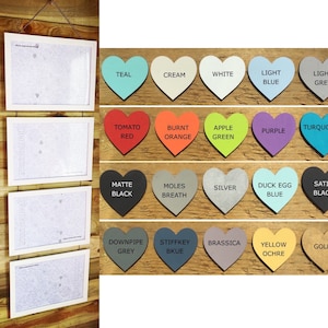 May include: A set of 30 heart-shaped colour swatches with names written in black text. The colours include teal, cream, white, light blue, light grey, tomato red, burnt orange, apple green, purple, turquoise, matte black, moles breath, silver, duck egg blue, satin black, downpipe grey, stiffkey blue, brassica, yellow ochre, and gold.