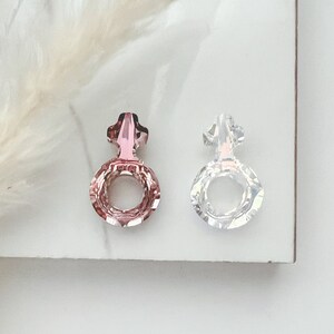 Genuine Swarovski Female Symbol Pendant in Antique Pink